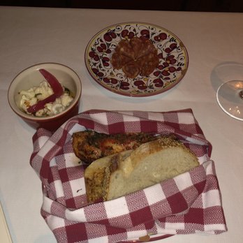 Carbone - Bread service with salami and marinated cauliflower - Italian Near Me - Las Vegas, Nevada Carbone - Bread service with salami and marinated cauliflower - Italian Near Me - Las Vegas, Nevada