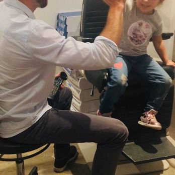 Look! Optometry - Dr. Stybel giving a great HI-5 to my daughter during the eye evaluation after using the eye mask hero to check her eyes - Optometrists Near Me - Manhattan Beach, California