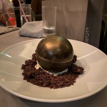 Maple & Ash - The chocolate ball and flambé dessert - Steakhouses Near Me - Scottsdale, Arizona