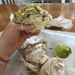Chicken wrap, with everything, Tazki & jalapeños Chicken wrap, with everything, Tazki & jalapeños