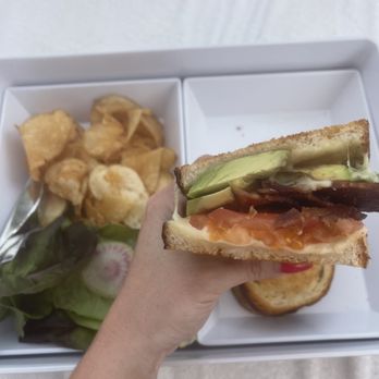 Malibu Farm - Grilled cheese panini with bacon, tomato and avocado with the house chips. - Breakfast & Brunch Near Me - Lanai City, Hawaii