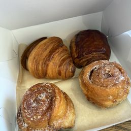 Sugar bun, butter croissant and chocolate croissant