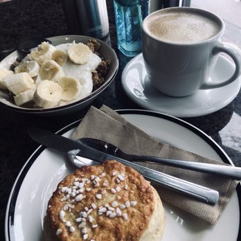 Kaffeeklatsch - Yogurt bowl with granola (I added my own banana), dirty chai soy latte, biscuit with butter & jam - Coffee & Tea Near Me - Seattle, Washington