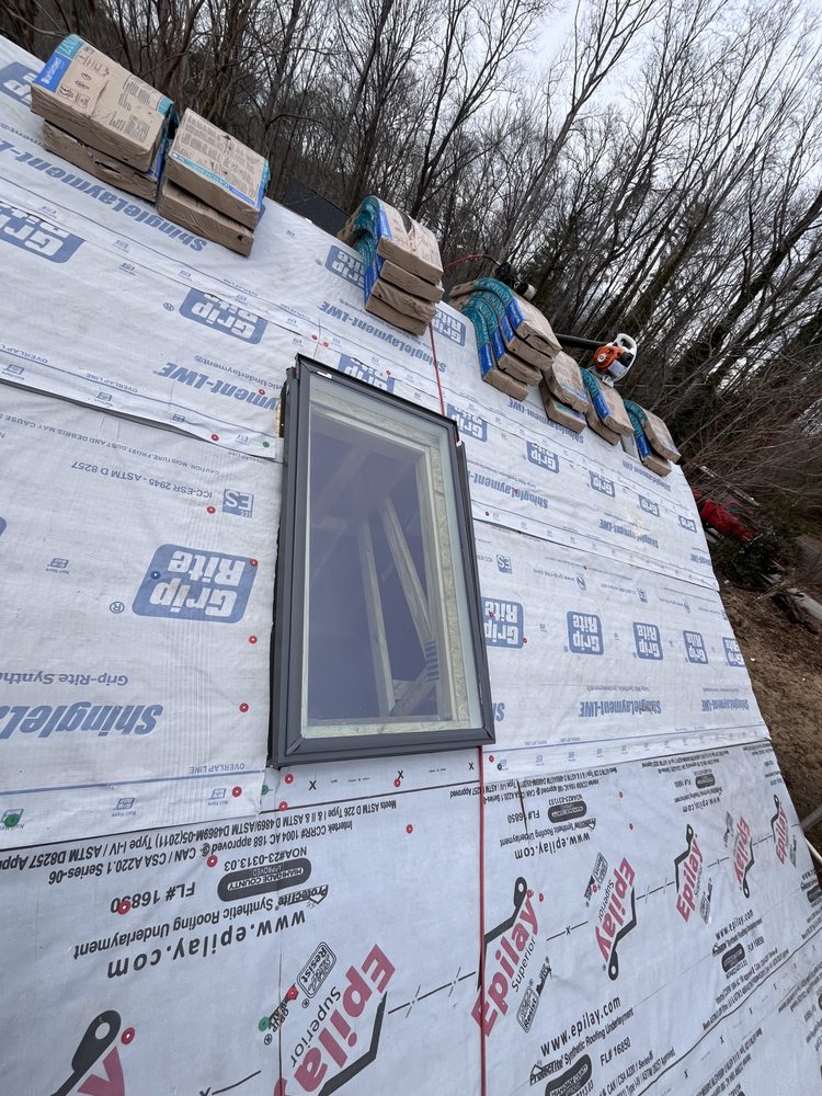 Slide of Wuilson’s Roofing