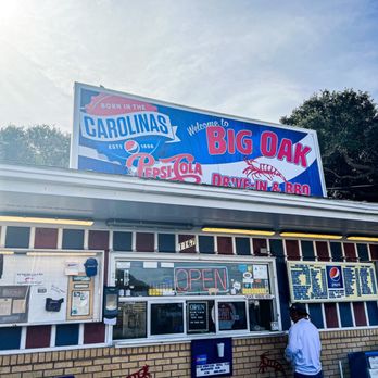 Big Oak Drive In & Bar-B-Que - ows a man standing in front of a restaurant - Barbeque Near Me - Salter Path, North Carolina