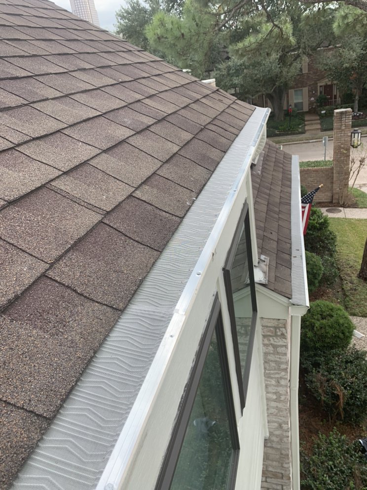 Slide of NL Strong Gutter & Roofing