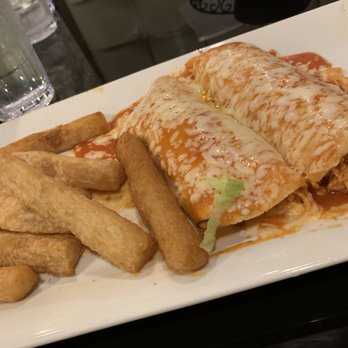 Takos Cantina - Enchiladas with fried yucca - Mexican Near Me - Bradenton, Florida Takos Cantina - Enchiladas with fried yucca - Mexican Near Me - Bradenton, Florida