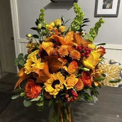 JE Flowers - Beautiful fall arrangement! Stunning selection of colors scheme.