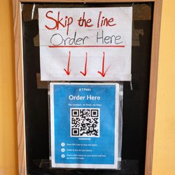 Tea Plus Tea Bar - Near front door sign to scan QR code and order ahead.