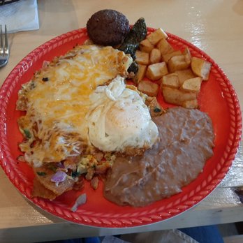 La Cabana - Migas, fried egg, refried beans, sausage, and papas. - Mexican Near Me - Lubbock, Texas