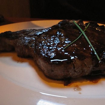 River Stone Chophouse - A 22 oz. bone in dry aged ribeye - Steakhouses Near Me - Suffolk, Virginia River Stone Chophouse - A 22 oz. bone in dry aged ribeye - Steakhouses Near Me - Suffolk, Virginia