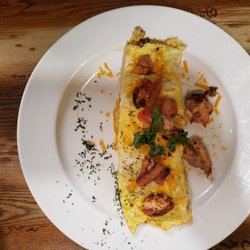 Huskers Cafe - Omelet with grilled salmon, cheddar cheese, and tomatoes