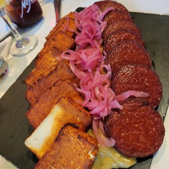 Mojo - Tres Golpes: Mashed green plantains, pickled onions, fried cheese, fried salami - Latin American Near Me - Forest Hills, New York