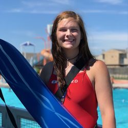YWCA Sun 'n Fun - Smiling female lifeguard.
