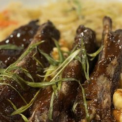 Jamaican Vibes Cuisine - Jerk ribs, cabbage, and Mac and Cheese