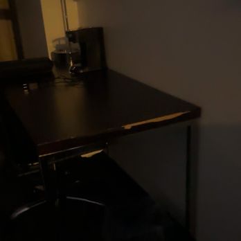 Harrah's Gulf Coast - The cheap, broken desk in our room that absolutely REEKS of cigarette smoke. - Hotels Near Me - Biloxi, Mississippi