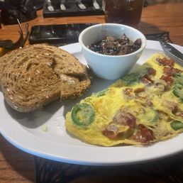 The Ch ch ch ah ah ahhmelette (with a substitution of caramelized onions instead of home fries. 7 grain toast. The Ch ch ch ah ah ahhmelette (with a substitution of caramelized onions instead of home fries. 7 grain toast.