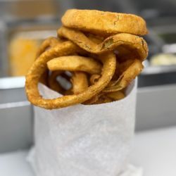 Jim's Burgers - Golden Home made onion rings.