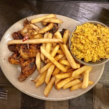 Nando's - Chicken thigh combo with chips and rice - Fast Food Near Me - London, XGL