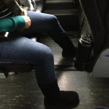 BoltBus - Girl straddles her seat to stop from slipping out - Transportation Near Me - Washington, DC, District of Columbia