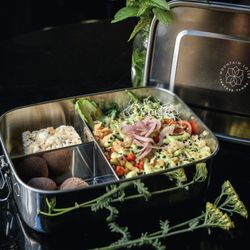 Bento Box, a sandwich or salad with a choice of two sides