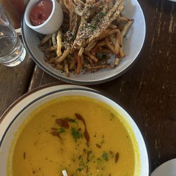 Vesta - Roasted Butternut Squash Soup Truffle Cacio Pepe Fries - Italian Near Me - Astoria, New York Vesta - Roasted Butternut Squash Soup Truffle Cacio Pepe Fries - Italian Near Me - Astoria, New York