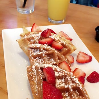 Dime Store - Waffles with Strawberries and cup of OJ. - Breakfast & Brunch Near Me - Detroit, Michigan Dime Store - Waffles with Strawberries and cup of OJ. - Breakfast & Brunch Near Me - Detroit, Michigan