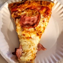 Hungry as a Wolf - My pizza slice with ham and extra cheese!
