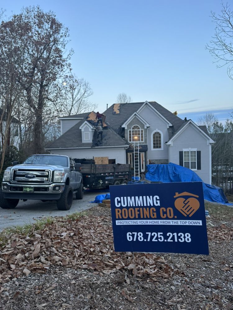 Slide of Cumming Roofing Company