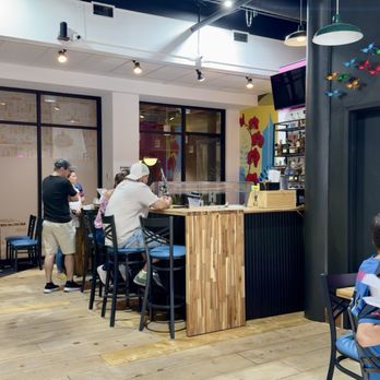 Tropico - Clean, colorful, and low-key vibey. Perfect spot to snack, sip, and side-eye the menu like: "Yeah... I do have room for one more." - Empanadas Near Me - Minneapolis, Minnesota