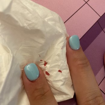 Irvine Nails - After I got home, I took this. You can clearly see she pushed back my skin and completely missed the cuticle on my index finger. - Nail Salons Near Me - Irvine, California