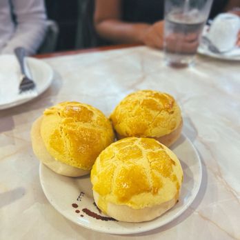 Spin & Savor - Egg yolk bun - Conveyor Belt Sushi Near Me - Rochester, New York Spin & Savor - Egg yolk bun - Conveyor Belt Sushi Near Me - Rochester, New York