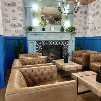 Summer Moon Coffee - Lounge chairs and fireplace - Coffee & Tea Near Me - Mauldin, South Carolina