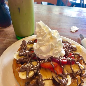 Bogart's Cafe - Waffle with strawberry and Nutella. Banana is extra topping - Breakfast & Brunch Near Me - Honolulu, Hawaii
