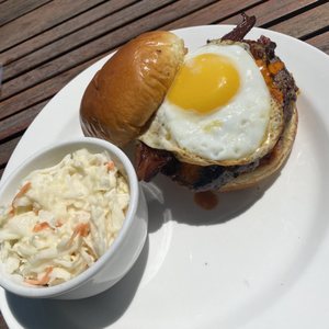 Photo of The Bay - Milwaukee, WI, United States. Bay burger with fried egg and coleslaw