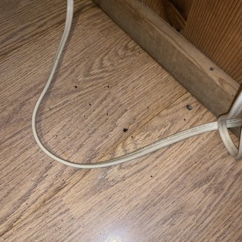 Yogi Bear's Jellystone Park - Floor by AC in bedroom, all this "stuff" was in the bed when we arrived and we had to keep cleaning it. - Campgrounds Near Me - Natural Bridge Station, Virginia