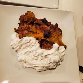 West End Bar & Kitchen - Figgy pudding-served warm, was soft and included actual figs - American Near Me - Del Mar, California