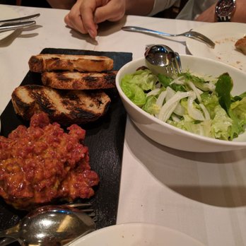Irati Taverna Basca - Aged beef tartare, with a side salad. You can really taste the funkyness you get with aged beef. - Tapas Bars Near Me - Barcelona, B Irati Taverna Basca - Aged beef tartare, with a side salad. You can really taste the funkyness you get with aged beef. - Tapas Bars Near Me - Barcelona, B