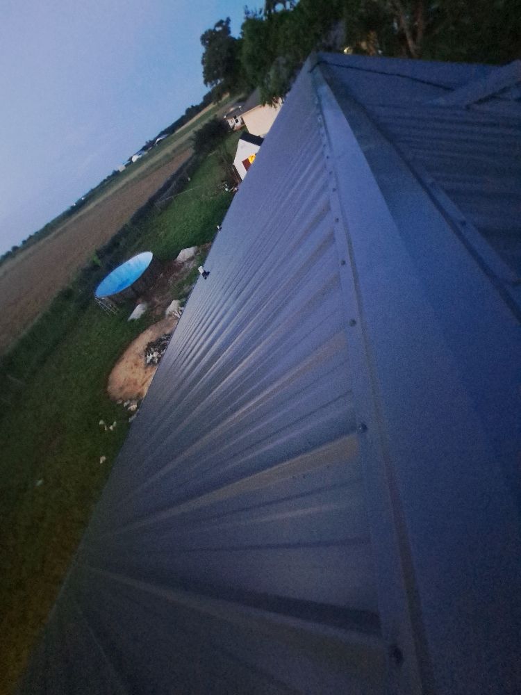 Slide of Mike's roofing and repairs