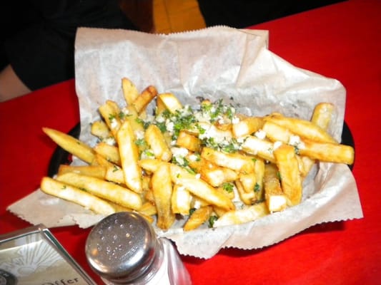 Photo of Acme Burgerhaus - San Francisco, CA, US. Acme's garlic fries - fresh garlicy goodness on top of a mountain of golden brown happiness.