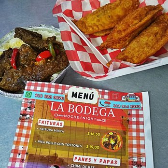 La Bodega - a menu and a plate of food - Dominican Near Me - Lincoln Park, Michigan