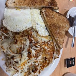 2 over hard, wheat toast and hash browns 2 over hard, wheat toast and hash browns