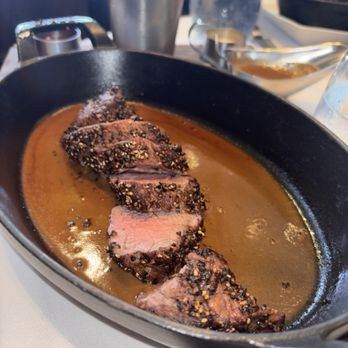 Tellers An American Chophouse - Filet Mignon Frites - Pepper Crusted Filet Mignon Tail, Au Poivre Sauce, Duck Fat Fries - Steakhouses Near Me - Islip, New York