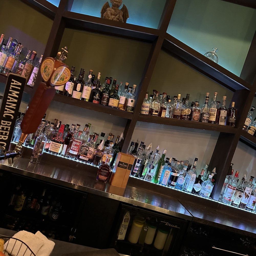 Lounge - a bar filled with bottles of alcohol - Lounges Near Me - Reno, Nevada