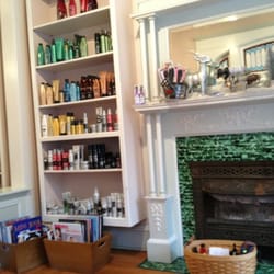 Panache Hair Designers - Comfortable parlor. Crank up the fireplace, girls!
