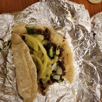Tacos y Refresqueria 95 - This is the bistec taco on corn tortillas with cilantro, onion and green salsa. Very good! - Mexican Near Me - Bastrop, Texas