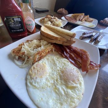 The In Place - 2 Eggs w/ Bacons and French Toast with side of Hash browns and Sausage Links + refillable orange and apple juice - American Near Me - Forks, Washington The In Place - 2 Eggs w/ Bacons and French Toast with side of Hash browns and Sausage Links + refillable orange and apple juice - American Near Me - Forks, Washington