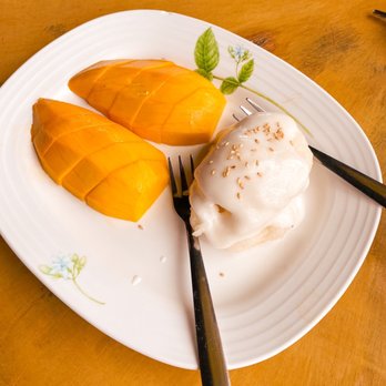 NaraDeva Thai Restaurant - Sweet Coconut Sticky Rice with mango - Thai Near Me - Orlando, Florida NaraDeva Thai Restaurant - Sweet Coconut Sticky Rice with mango - Thai Near Me - Orlando, Florida