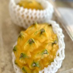 Costco Wholesale - Yellow dragon fruit is really good & much sweeter than the red skin (white flesh) ones.