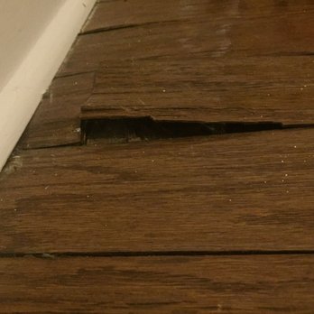 Distinctive Nashville Rentals - Broken floorboards--safety hazard - Real Estate Services Near Me